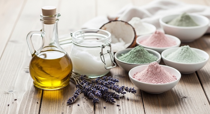 soap making supplies, olive oil, and natural powders for coloring